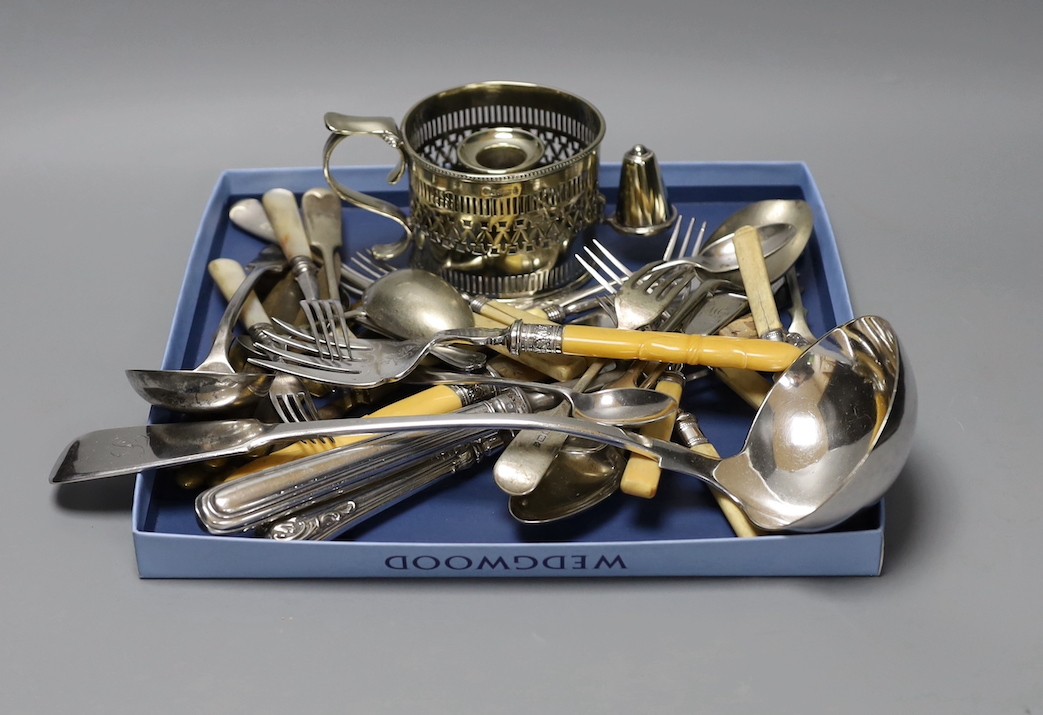 Mixed plated items including chamberstick, pair of fish servers, plated soup ladle and other flatware.